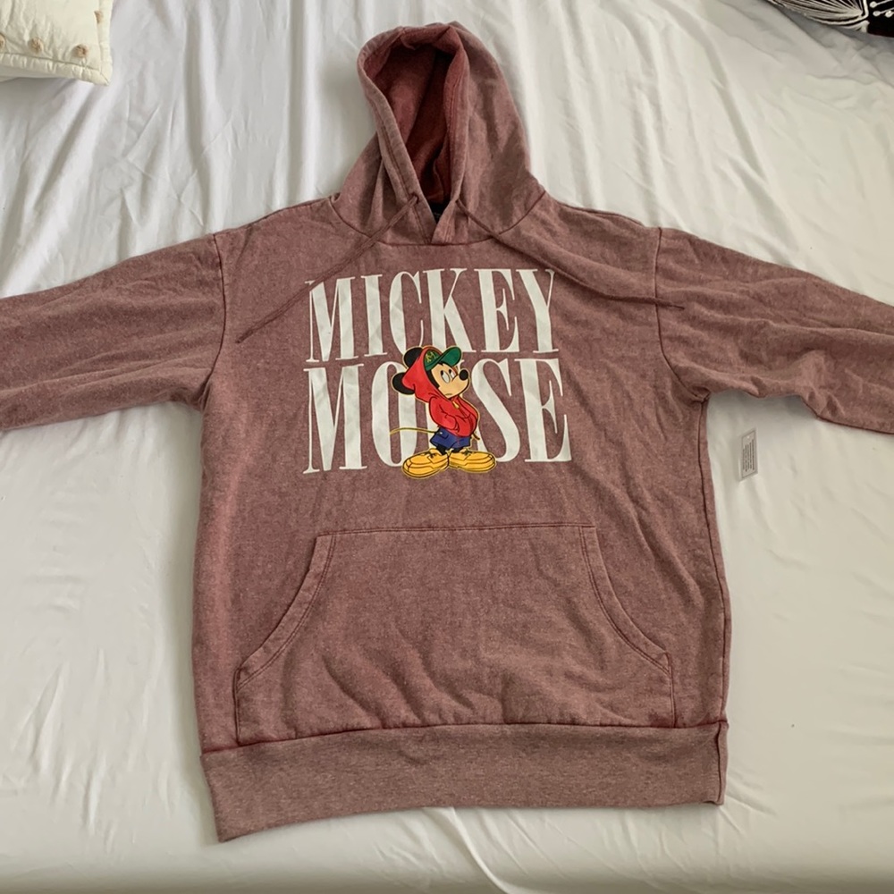 Mickey sweatshirt. Color is like a red Sand color